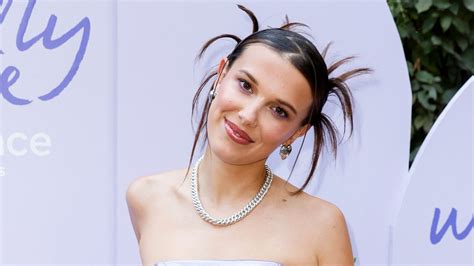 Millie Bobby Brown shows off her many tattoos in daring new。